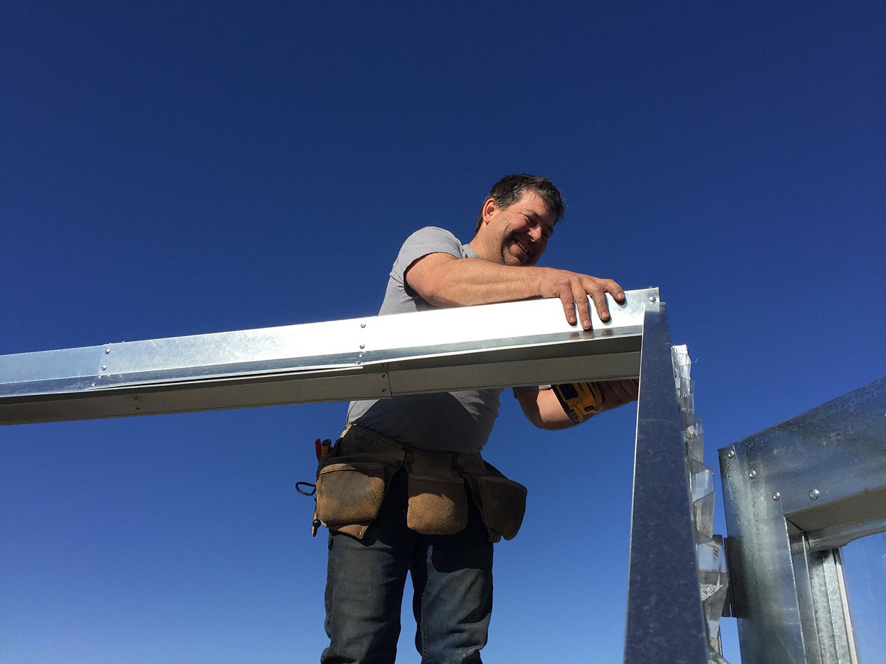 loren daoust building assembling greenhouse alberta